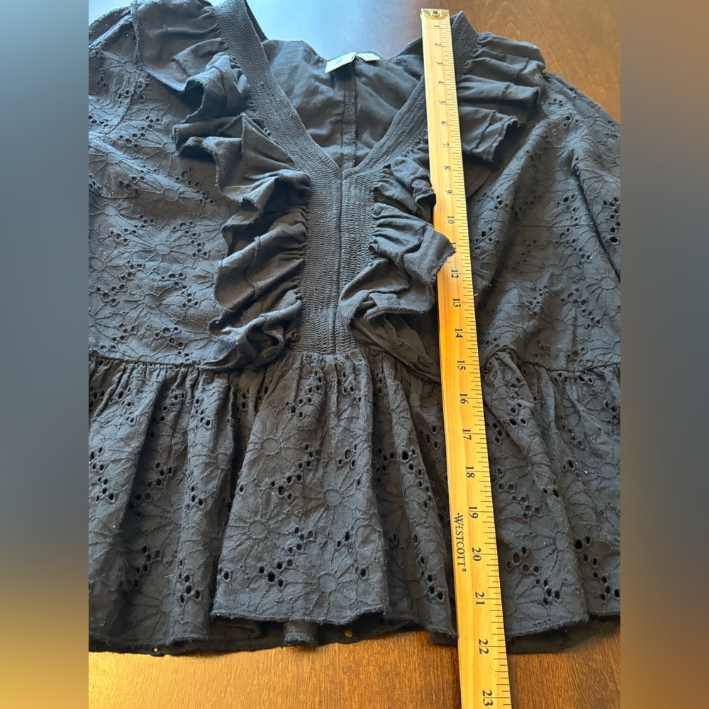 Ruffled V-Neck Peplum Blouse in Black - Picture 9 of 9